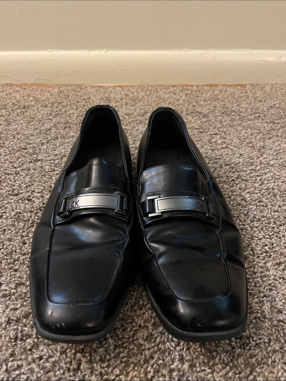 Calvin Klein Black Leather Slip-On Loafers with Metal Accent - Picture 2 of 4